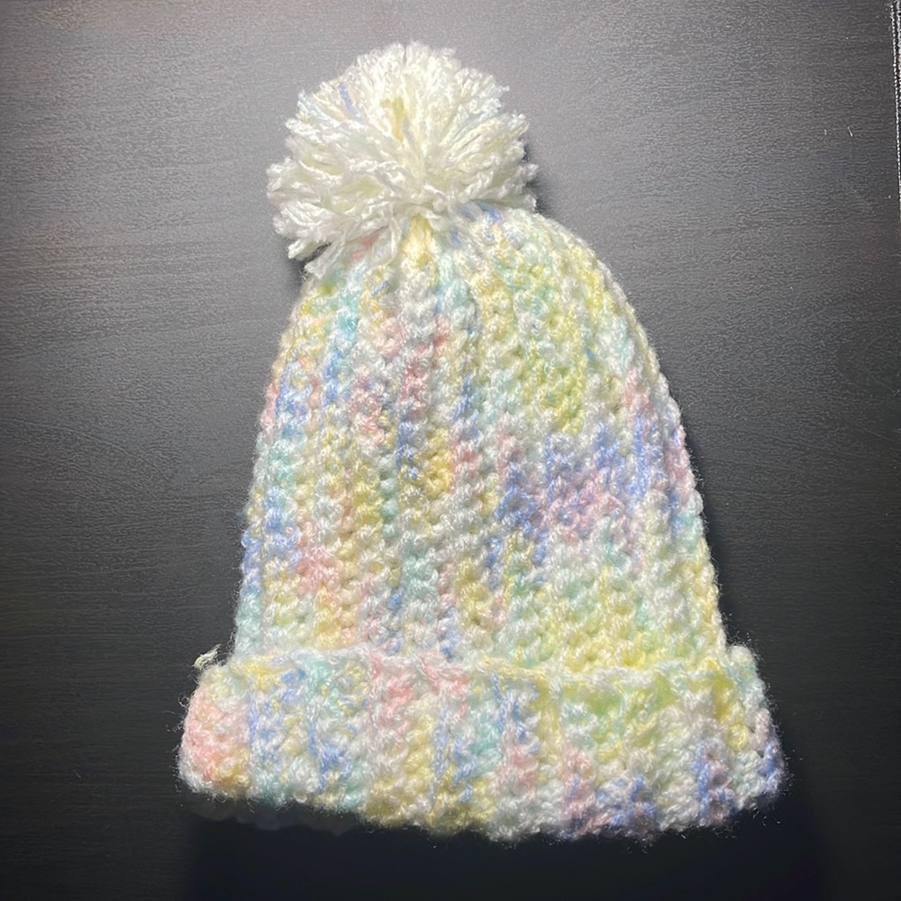 Baby beenie, I have 3 different colors, home made by my mom.